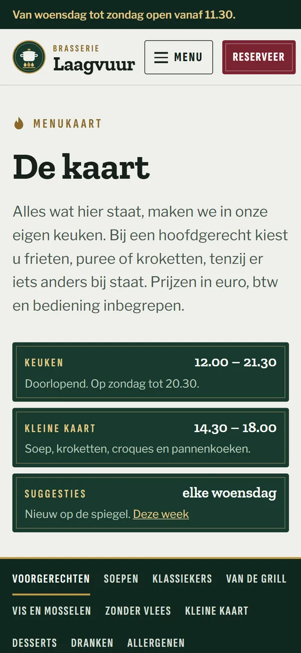 De kaart in de website voor een restaurant, het begin van de pagina op een gsm